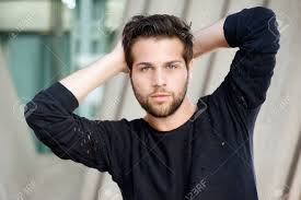 Close Up Portrait Of A Male Fashion Model Posing With Hands Behind Stock Photo Picture And Royalty Free Image Image 31695533 The more you flatter and empower your clients (male or female), the more they will feel free to be themselves and loosen up in front of your camera. close up portrait of a male fashion model posing with hands behind