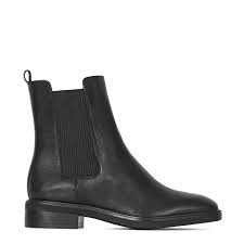 Black leather ankle boots with a flat sole - BRAVOMODA