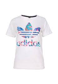 The way you dress has a direct impact on how people perceive you. Adidas Tropical Logo T Shirt A Gorgeous Twist To Your Classic Adidias White Tee Shop Branded Tees Womens Fashion Shopping Fashion Online Shop Womens Fashion