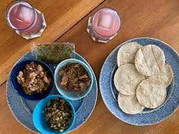 This is a complete meal kit with pork carnitas, poblano peppers and onions, cilantro pesto sauce, and corn tortillas. Aldi Street Taco Kit Review Kitchn