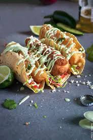 It's super simple to make. Crunchy Fish Tacos With Avocado Lime Sauce Urban Bakes