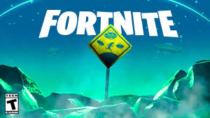 In this photo illustration the fortnite logo is seen on a smartphone and a pc screen. Fortnite Montage