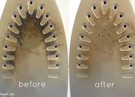 Place two folded white and green towels side by side. The Real Diy To Clean A Burnt Iron