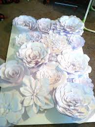 This flower wall is an endlessly customizable prop, so if you're inspired to create a variation, go for it! How I Built A Giant Flower Wall As Cheaply As Possible Giant Flower Wall Paper Flower Wall Paper Flowers