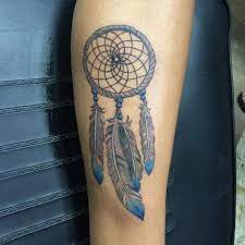 The 60 Most Popular Dreamcatcher Tattoos Of All Time Dream Catcher Tattoo Design Dream Catcher Tattoo Tattoo Designs And Meanings
