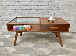 With weather and water resistant qualities, a teak coffee table in a round, rectangular, or square shape is an investment piece that you'll enjoy and use year after year. Mid Century Teak Coffee Table With Drawer 859 Home Coffee Table With Drawers Teak Coffee Table Coffee Table