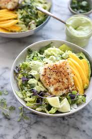 It's been fun making your tacos with the sauce and slaw and experimenting with different fish. Healthy Fish Taco Bowls With Avocado Slaw And Mango Gluten Free