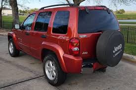 Image result for Flame Red 2002 Jeep