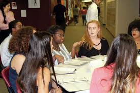Students tackle real-world issues at Summer Creek symposium