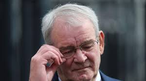 Massacre Victim 'Hid Under Dead Colleagues'