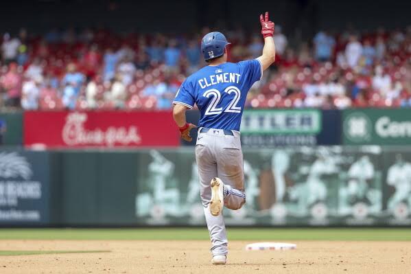 Blue Jays third baseman Ernie Clement leaves game in 9th after banging knee  diving for a grounder | AP News