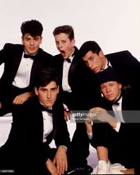 He was a member of the massively popular boy band new kids on the block. Portrait Of American Pop Group New Kids On The Block Posed Against A New Kids On The Block New Kids Nkotb