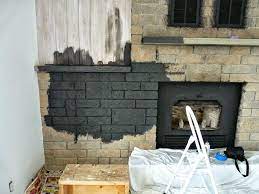 Fireplace before after by all those details doors brass makeover seating. How To Easily Paint A Stone Fireplace Charcoal Grey Fireplace Makeover Dans Le Lakehouse Stone Fireplace Makeover Painted Stone Fireplace Paint Fireplace