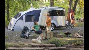 We bought this and found out that when my wife stays up and i go to bed the half bed and table she reads at r too close together. Walk Through 2007 Airstream Basecamp 16 Toy Hauler Bambi Size Camper Rv Trailer Youtube