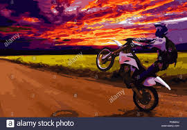 Knallen Einen Wheelie Bei Sonnenuntergang Stockfotografie Alamy