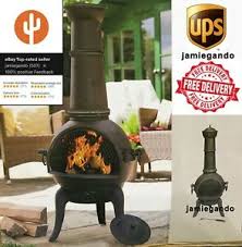 Large theatrical fire pit with stylish chimney and practical grated door access. La Hacienda Cast Iron Steel Chiminea Fire Pit Fireplace Garden Patio Heater Ebay