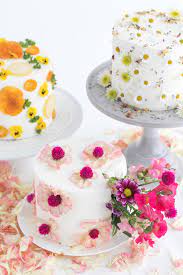 Edible flowers pressed into the exterior of this confection, which was made by earth and sugar, gave this treat a color look. Decorate A Cake Using Edible Flowers Edible Flower Cakes 100 Layer Cake