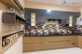 As it utilizes only two adjacent walls, one length can be adjusted without crowding the area. L Shaped Modular Kitchen Designs In Bangalore
