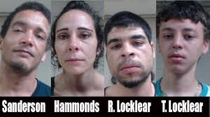 Four arrested after bottles with contraband thrown over prison fence