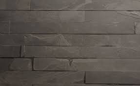 Simple herringbone tile pattern with purple tiles. Slate Brazilian Black Calibrated Riven Herringbone 60x400x10mm Tiles R Us