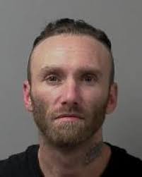 Four men charged after shooting outside gas station