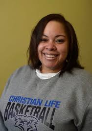 CLS girls basketball coach Tenisha Williams-Jelks carries