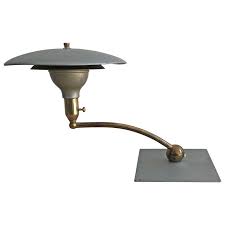 This task lamp is aesthetically interesting, but is lacking a bit in terms of functionality. Mid Century Modern Dazor Flying Saucer Sight Light Table Lamp For Sale At 1stdibs