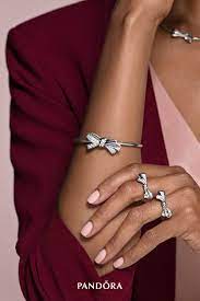 This Mother S Day Celebrate Her For The Woman She Is With Our Timeless Bow Jewellery Crafted In Pandora Bracelet Charms Bow Jewelry Vintage Inspired Necklace