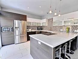 Kitchen cabinet doors custom made modern aluminum frame. Condo Chalet Ou Maison A Vendre Avec Un Courtier Immobilier Modern Kitchen Design Modern Kitchen Kitchen Design