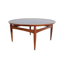 With all of the storage available, this old steamer trunk has plenty of upcycling potential. 1960s Vintage Ejvind Johansson Danish Modern Flip Top Coffee Table Chairish Coffee Table Teak Coffee Table Teak Tray