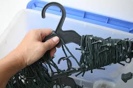 How To Store Christmas Lights Around A Coat Hanger Christmas Hacks Holiday Hack Christmas Diy