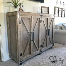 How to build a tall cabinet or pantry with cane door. Diy Farmhouse X Storage Cabinet Shanty 2 Chic