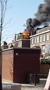 De brandweer heeft opgeschaald naar grote brand. Brand Verwoest Achterzijde Woningen Luxemburgstraat Regio15 Nl
