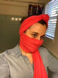 Go from cute headband to practical face cover in a flash with this bright  pink Carmen scarf! It's 100% viscose, made in India, helps kids go to  school, AND this is the