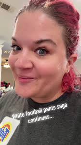 Girl in White Pants with Football Player