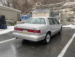 Image result for Medium Driftwood 1997 Chrysler