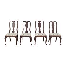 These upholstered dining chairs have pieces on either side of the back of the chair and are an unusual but classy complement for the dining table. 59 Off World Market World Market Dining Chairs Chairs