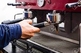 Experience third wave specialty coffee at home with a sage drip coffee machine. Barman Making Espresso In Modern Coffee Machine Closeup Of Male Hand Preparing Bracing Beverage Small Business And Professional Coffee Brewing Concept Stock Photo Picture And Royalty Free Image Image 88882655