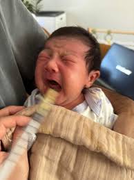 My 8 weeks baby was introduced formula since day 1 as I knew bottle refusal  struggle with my first child. But suddenly at 2 weeks mark, she started  fussing, crying when taking