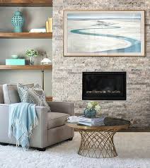 Awesome television over electric fireplace on this favorite site. The Frame Is Mounted On Brick Wall In Living Room Above A Fireplace Displaying A Photograph In Modern Layout With Home Fireplace Livingroom Layout Modern Brick