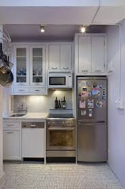 The key to successful narrow kitchen design is functionality. 10 Tiny Kitchens In Tiny Houses That Are Adorably Functional Small Apartment Kitchen Small Kitchen Decor Tiny Kitchen Design