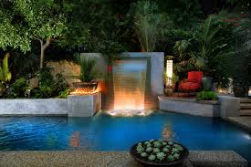 Backyard pool design at its best. Los Angeles Modern Cascade Garden Pool Tropical Pool Los Angeles By Luxe H2o Inc Luxury Pools Landscapes Houzz