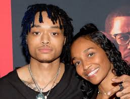 Well alright!...TLC's Chilli is going to be a grandma...Her son, 26 year  old Tron Austin and his wife Luna just announced that they are expecting  their first child...Tron's dad is producer Dallas