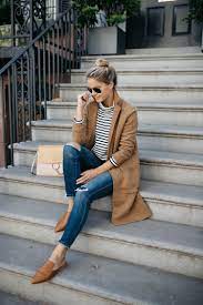 Wearing a mini dress and lace up boots, over 40. Pin On Style