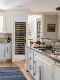 Full size wine fridge in kitchen. Buy The Best Wine Refrigerator To Store Your Wine Collection