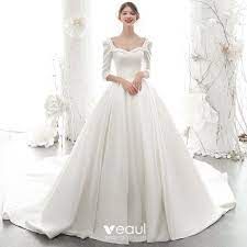 Adding a modern twist to your bridal look is as easy as finding a wedding dress with a square neckline. Vintage Retro Ivory Satin Bridal Wedding Dresses 2020 Ball Gown Square Neckline 3 4 Sleeve Backless Beading Pearl Chapel Train Ruffle Wedding Dresses White Ball Gowns Pearl Wedding Dress
