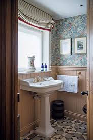 Fake tiling with adhesive wall and floor solutions Bathrooms On A Budget 34 Chic Yet Cheap Bathroom Ideas Real Homes