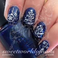 These nail art christmas designs tutorials include snowflake nail art, rudolph, candy cane, christmas tree and even a plaid design. Silver Merry Christmas Nail Art