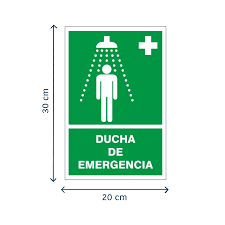 Pictogramas de seguridad para laboratorios: Una persona señalando una ducha de emergencia de color verde brillante, destacando la importancia de la señalización de condición segura.