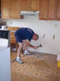 Cover any vents and remove the moldings using a pry bar. Removing Kitchen Tile Floor Without Damaging Or Removing Cabinets